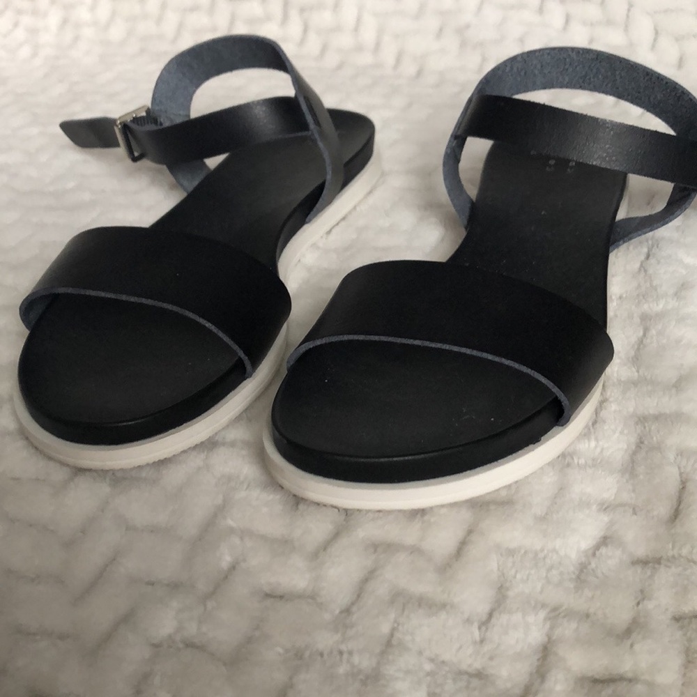Black buckle sandals